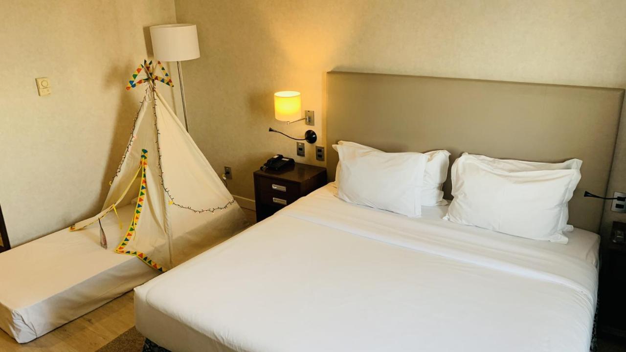 阿尔法城丽笙酒店 巴路里 外观 照片 A room at the hotel